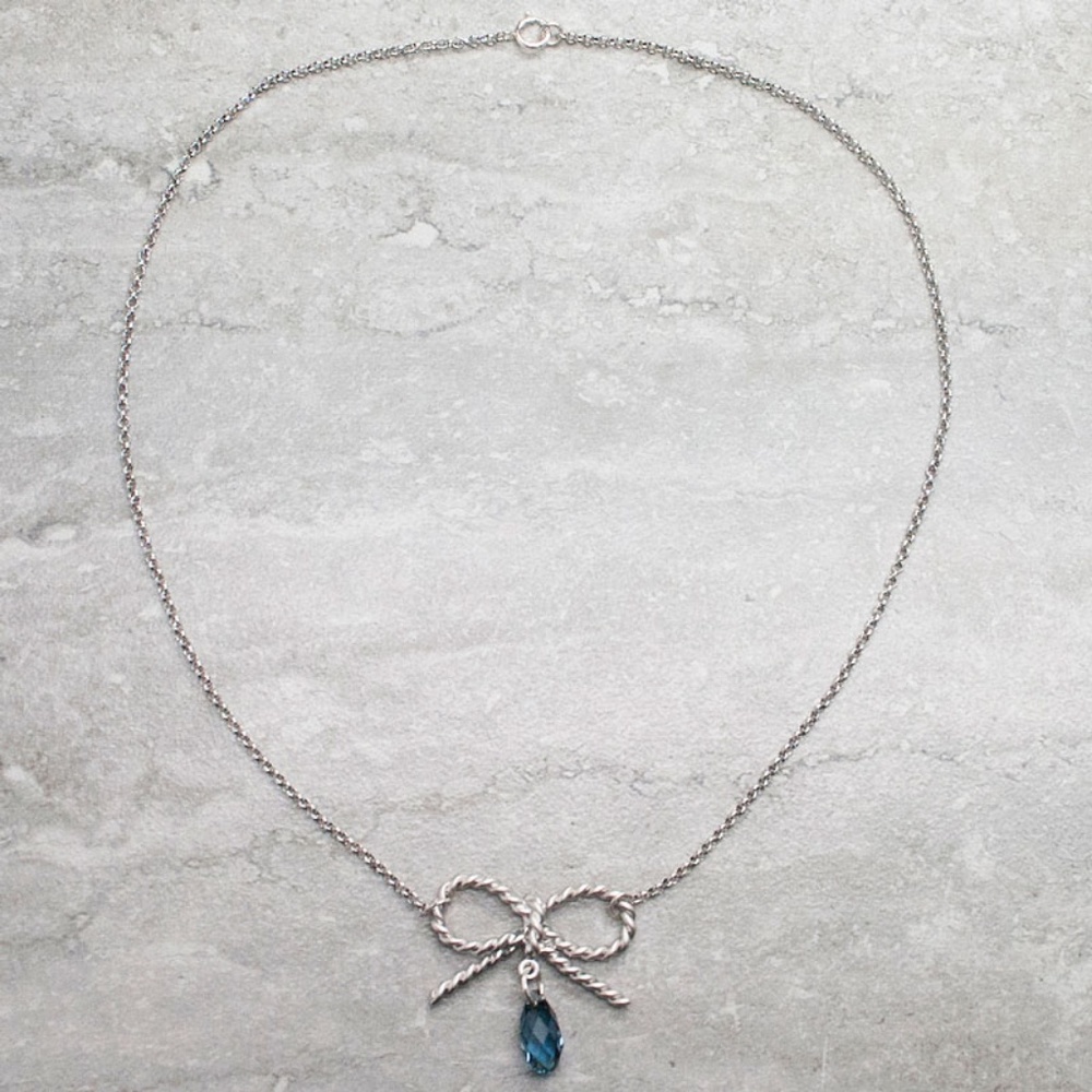 Blue crystal & bow necklace